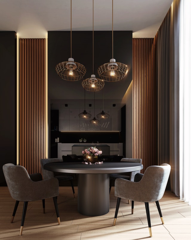 Modern dining room and kitchen; New geometric light fixtures and modern decor.